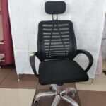 Secretarial chair with head rest