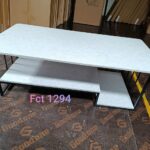 White marble coffee table with black stand